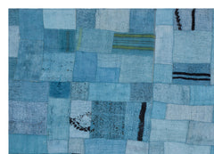 Teselya Turquoise Patchwork Wool Handmade Area Rug 5'3" x 7'4"