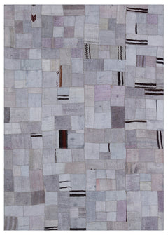 Teselya Purple Patchwork Wool Handmade Area Rug 5'7" x 7'10"