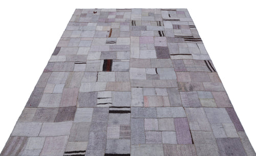 Teselya Purple Patchwork Wool Handmade Area Rug 5'7" x 7'10"