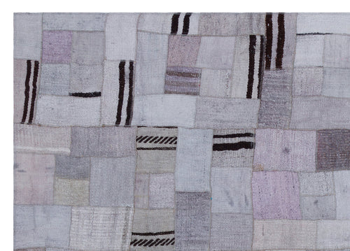 Teselya Purple Patchwork Wool Handmade Area Rug 5'7" x 7'10"