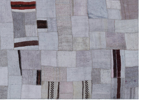 Teselya Purple Patchwork Wool Handmade Area Rug 5'7" x 7'10"