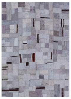 Teselya Purple Patchwork Wool Handmade Area Rug 5'7" x 7'10"