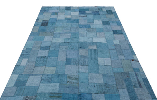 Teselya Turquoise Patchwork Wool Handmade Area Rug 5'3" x 7'5"