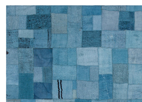 Teselya Turquoise Patchwork Wool Handmade Area Rug 5'3" x 7'5"
