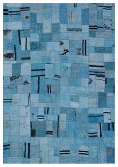 Teselya Turquoise Patchwork Wool Handmade Area Rug 5'3" x 7'5"