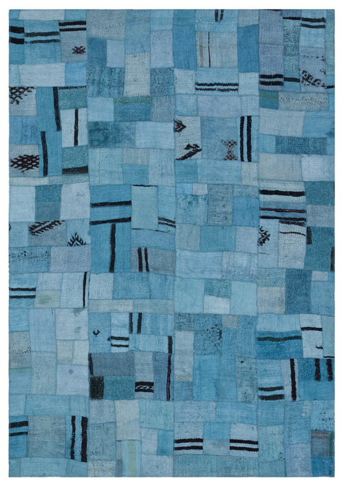 Teselya Turquoise Patchwork Wool Handmade Area Rug 5'3" x 7'5"