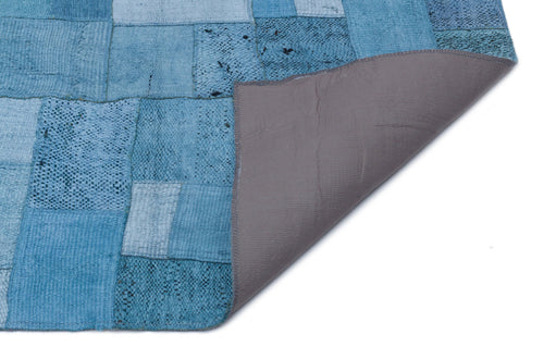 Teselya Turquoise Patchwork Wool Handmade Area Rug 5'3" x 7'3"