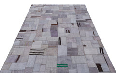 Teselya Purple Patchwork Wool Handmade Area Rug 5'3" x 7'4"