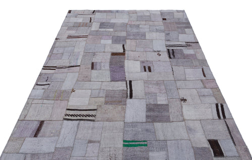 Teselya Purple Patchwork Wool Handmade Area Rug 5'3" x 7'4"