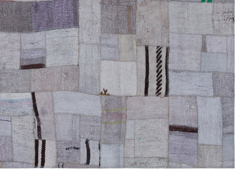 Teselya Purple Patchwork Wool Handmade Area Rug 5'3" x 7'4"