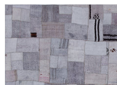 Teselya Purple Patchwork Wool Handmade Area Rug 5'3" x 7'4"