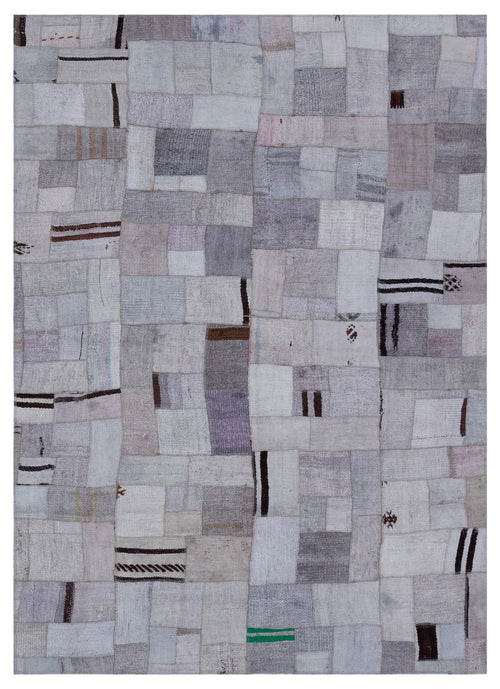 Teselya Purple Patchwork Wool Handmade Area Rug 5'3" x 7'4"