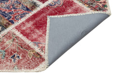 Iskece Red Patchwork Wool Handmade Area Rug 5'4" x 7'8"