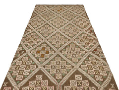 Girit Brown Geometric Wool Handmade Area Rug 4'9" x 8'4"