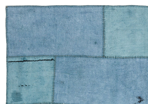 Teselya Turquoise Patchwork Wool Handmade Area Rug 5'1" x 7'4"