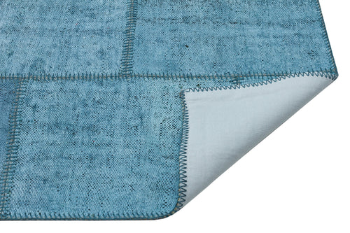 Teselya Turquoise Patchwork Wool Handmade Area Rug 5'1" x 6'11"