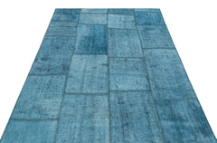 Teselya Turquoise Patchwork Wool Handmade Area Rug 5'1" x 6'11"