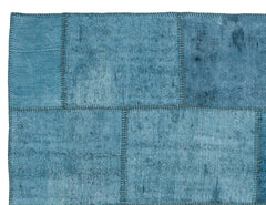 Teselya Turquoise Patchwork Wool Handmade Area Rug 5'1" x 6'11"