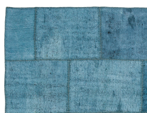 Teselya Turquoise Patchwork Wool Handmade Area Rug 5'1" x 6'11"