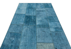 Teselya Purple Patchwork Wool Handmade Area Rug 5'1" x 7'5"