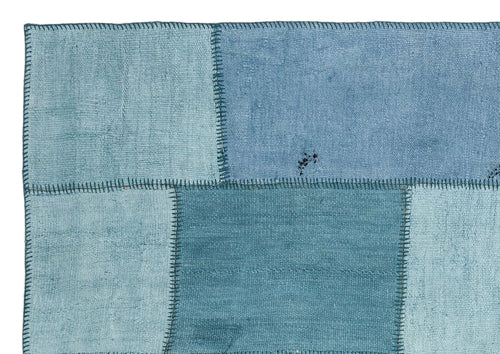 Teselya Turquoise Patchwork Wool Handmade Area Rug 5'1" x 7'4"