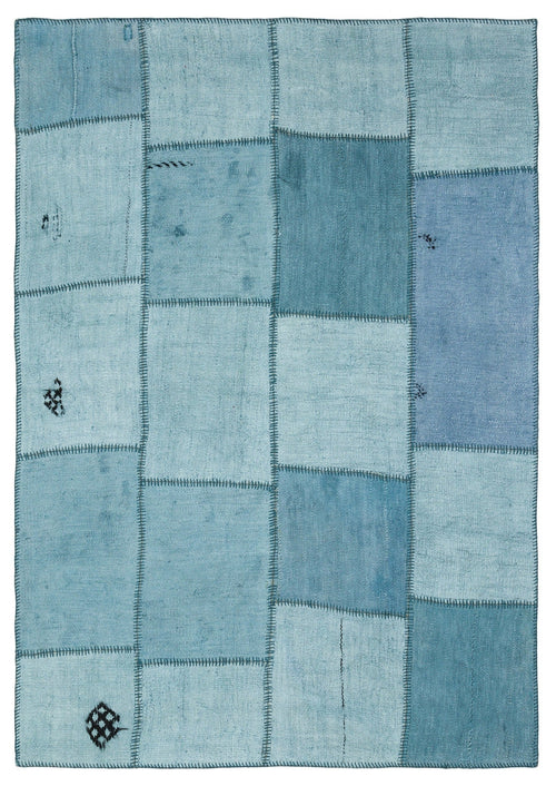 Teselya Turquoise Patchwork Wool Handmade Area Rug 5'1" x 7'4"