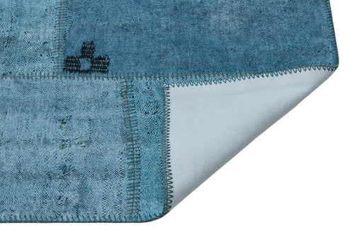 Teselya Turquoise Patchwork Wool Handmade Area Rug 5'1" x 7'5"