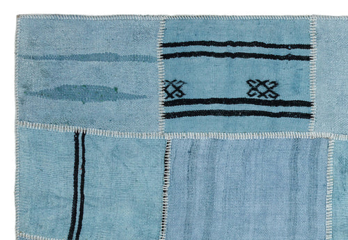 Teselya Blue Patchwork Wool Handmade Area Rug 5'2" x 7'6"