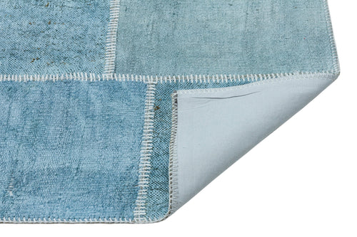 Teselya Turquoise Patchwork Wool Handmade Area Rug 5'1" x 7'3"