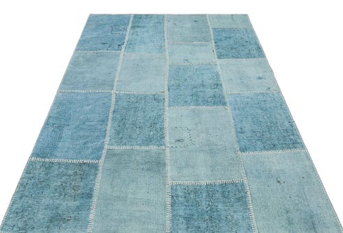 Teselya Turquoise Patchwork Wool Handmade Area Rug 5'1" x 7'3"
