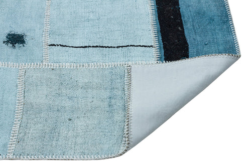 Teselya Turquoise Patchwork Wool Handmade Area Rug 5'0" x 6'9"