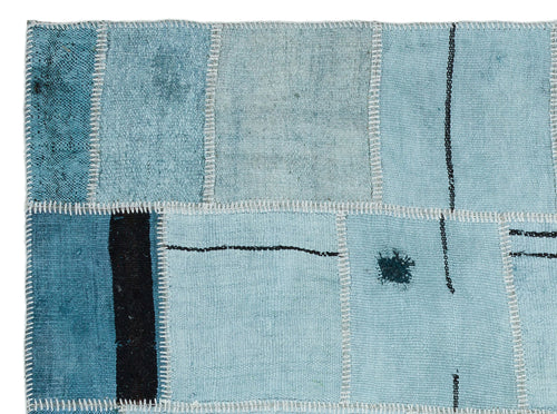 Teselya Turquoise Patchwork Wool Handmade Area Rug 5'0" x 6'9"