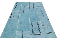 Teselya Blue Patchwork Wool Handmade Area Rug 4'11" x 7'1"