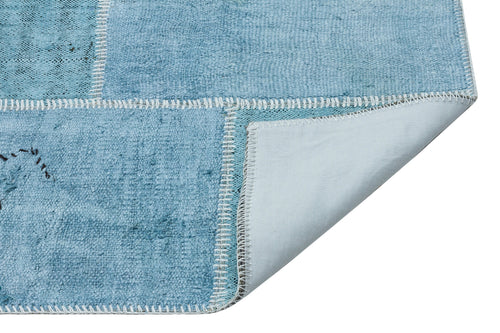 Teselya Turquoise Patchwork Wool Handmade Area Rug 5'2" x 7'3"