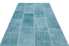 Teselya Turquoise Patchwork Wool Handmade Area Rug 5'2" x 7'3"