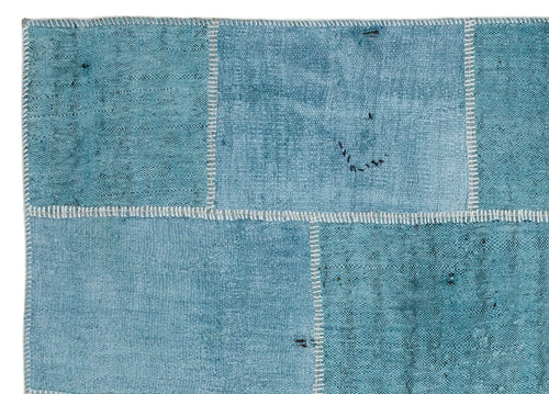 Teselya Turquoise Patchwork Wool Handmade Area Rug 5'2" x 7'3"