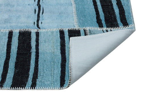 Teselya Blue Patchwork Wool Handmade Area Rug 5'3" x 7'1"