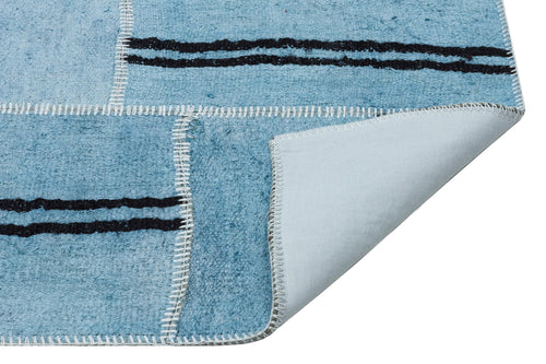 Teselya Turquoise Patchwork Wool Handmade Area Rug 5'3" x 7'1"