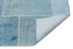 Teselya Turquoise Patchwork Wool Handmade Area Rug 5'3" x 7'3"