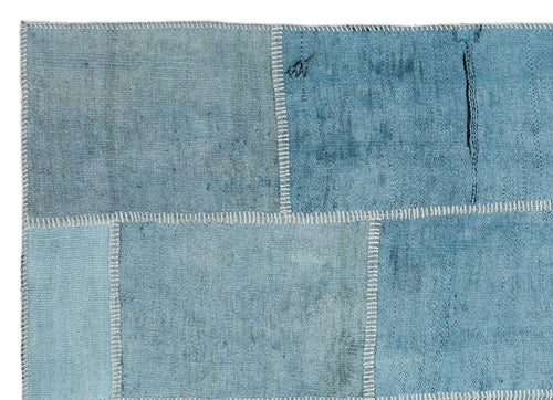 Teselya Turquoise Patchwork Wool Handmade Area Rug 5'3" x 7'3"