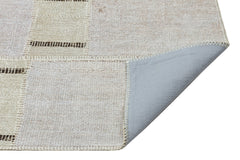 Teselya Beige Patchwork Wool Handmade Area Rug 3'10" x 5'9"