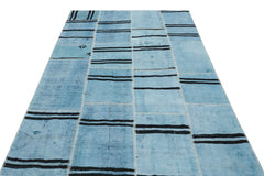 Teselya Turquoise Patchwork Wool Handmade Area Rug 5'2" x 7'6"