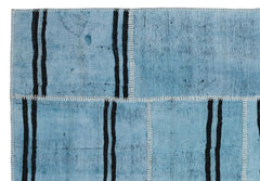 Teselya Turquoise Patchwork Wool Handmade Area Rug 5'2" x 7'6"