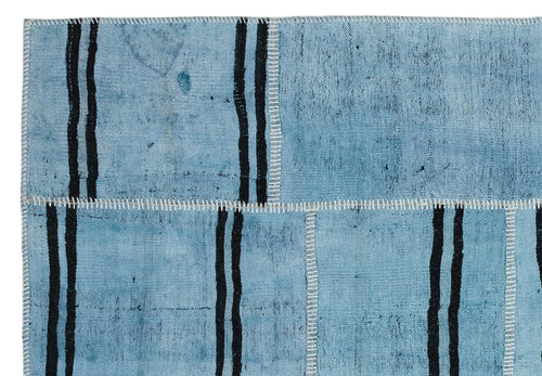 Teselya Turquoise Patchwork Wool Handmade Area Rug 5'2" x 7'6"