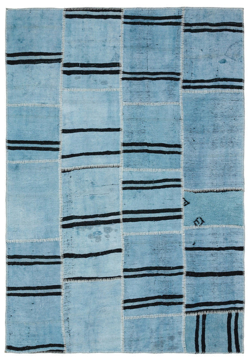 Teselya Turquoise Patchwork Wool Handmade Area Rug 5'2" x 7'6"