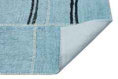 Teselya Turquoise Patchwork Wool Handmade Area Rug 5'3" x 6'10"