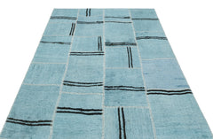 Teselya Turquoise Patchwork Wool Handmade Area Rug 5'3" x 6'10"