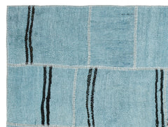 Teselya Turquoise Patchwork Wool Handmade Area Rug 5'3" x 6'10"