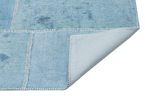 Teselya Turquoise Patchwork Wool Handmade Area Rug 5'2" x 7'6"