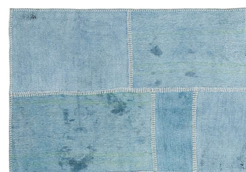 Teselya Turquoise Patchwork Wool Handmade Area Rug 5'2" x 7'6"